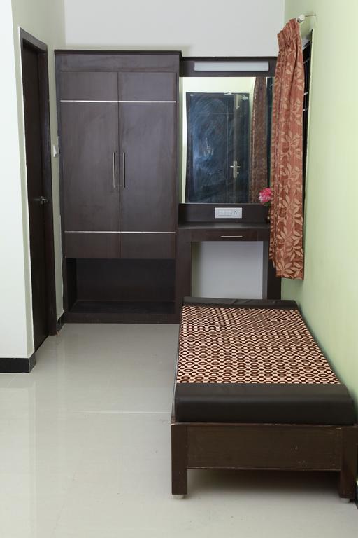 Hotel Jeyam Residency, Kumbakonam Pokoj fotografie